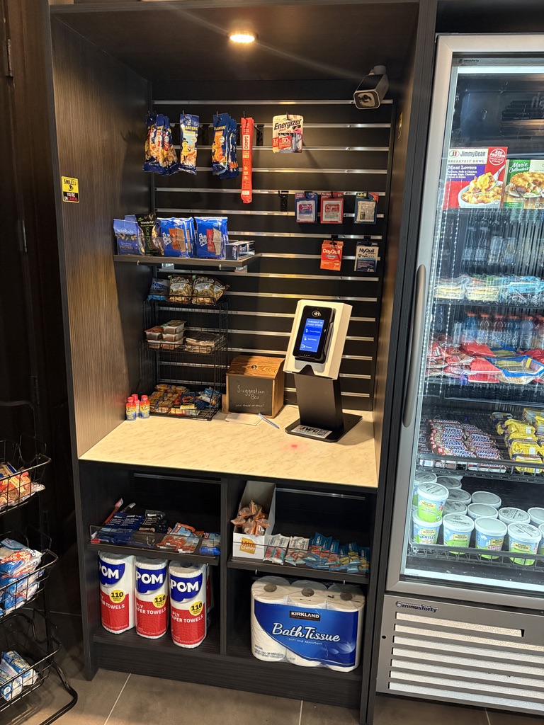 Micro Market essentials section showing household supplies, personal care items, and office supplies